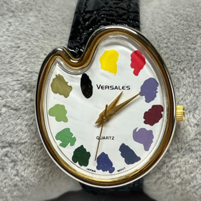 RARE Ladies Versales Paint Shape Gold Tone Quartz Watch