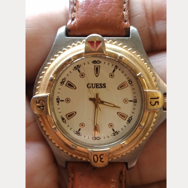 Guess golden rotating bezel, Milky Dial, Japan Movement, Quartz Watch