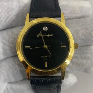 Classique Stainless Steel Back Golden Face Black Stripe Wristwatch 1