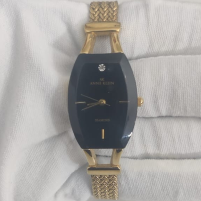 AK Anne Klein 10/8030 Stainless Steel Back Gold Tone Ladies Wristwatch