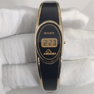 Vintage Jordache Women’s Black Gold Toned Cuff Band Digital Wristwatch