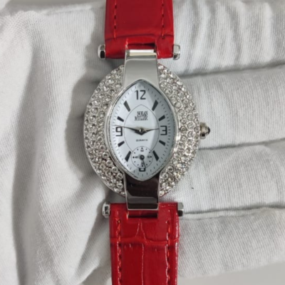 The Nolan Miller Glamour Collection  Ladies Wristwatch